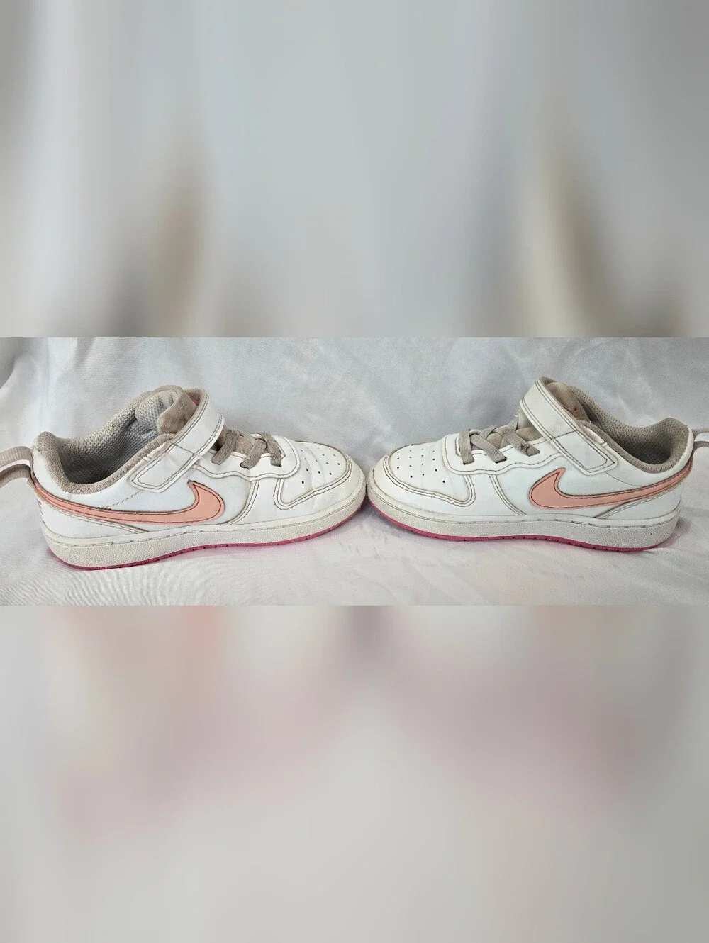 Nike Kids White Sneakers with Pink Swoosh and Pink Outsole